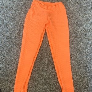 Bright orange leggings